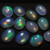 8x10 mm oval - Ethiopian Opal - really high quality CABOCHON have amazing beautifull flashy fire all around in the stone - 12 pcs